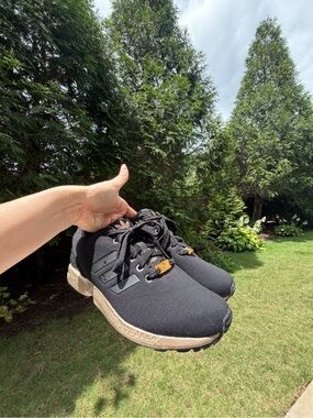 adidas black and gold Accent women’s Sneakers